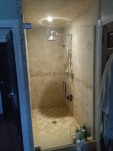 travertine shower stall by Terrazzo Creations Inc